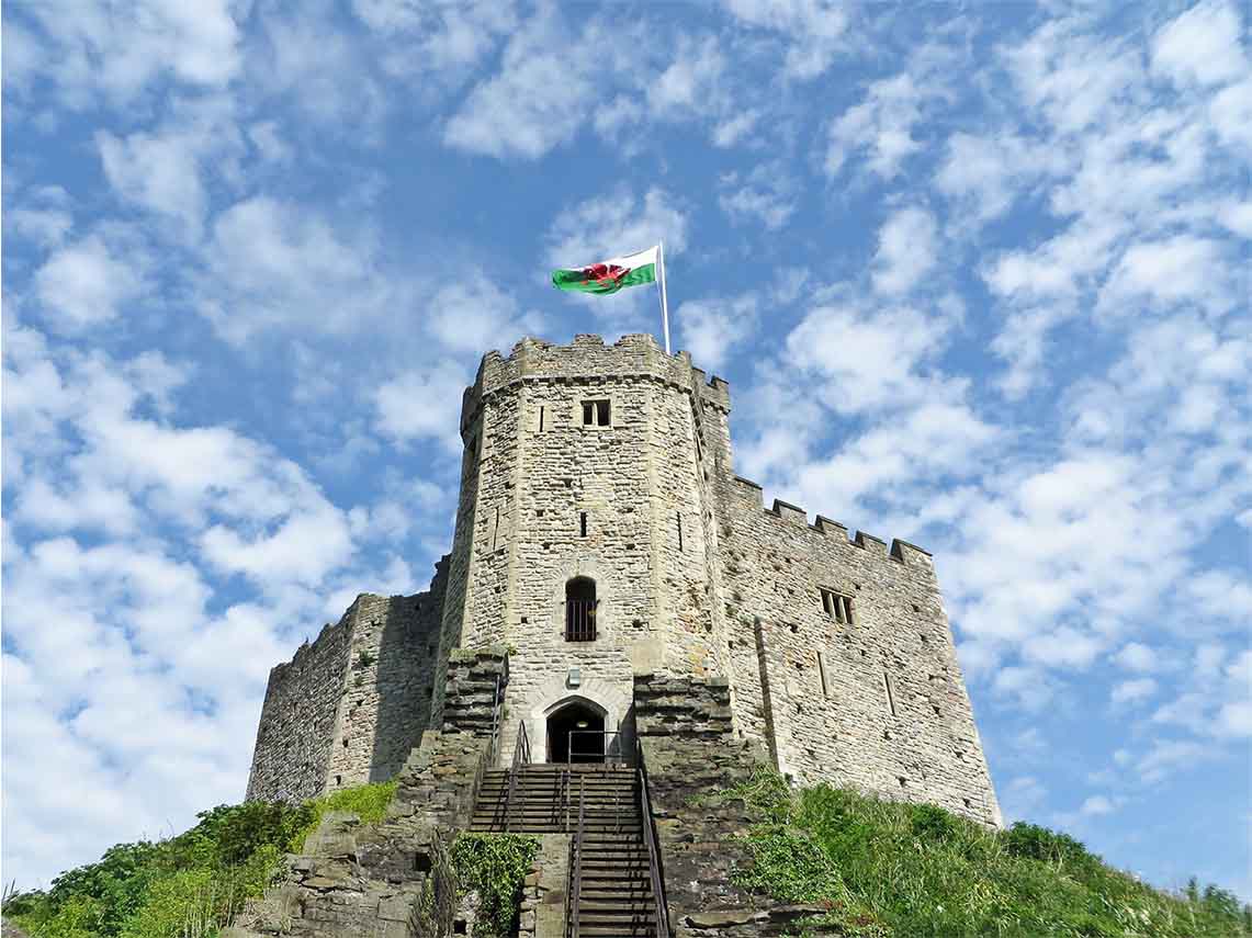 view looking up from the bottom of the steps at entrance to Cardiff Castle.